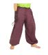 pantalones harén presión étnico, con grandes bolsillos laterales de color púrpura
