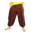 Pantalones Om Goa con estampado floral marrón
