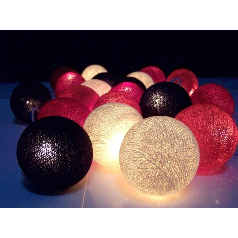 Christmas lights made of cotton balls, black red mix