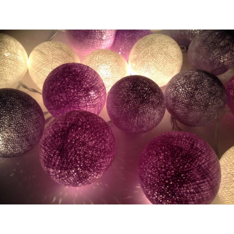 Christmas lights made of cotton balls, gray violet